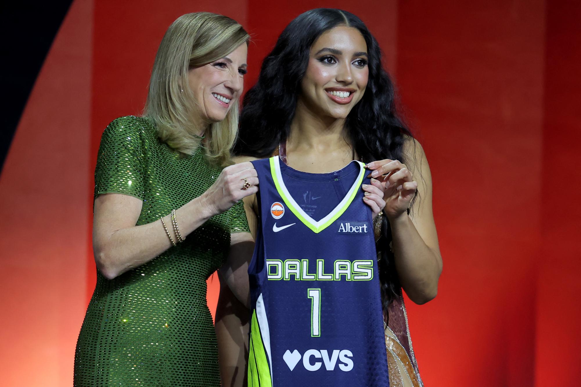 Apr 13, 2026; New York, NY, USA; WNBA Commissioner Cathy Engelbert (left) poses for photos with Azzi Fudd who was selected first overall by the Dallas Wings during the 2026 WNBA Draft at The Shed at Hudson Yards. Mandatory Credit: Brad Penner-Imagn Images